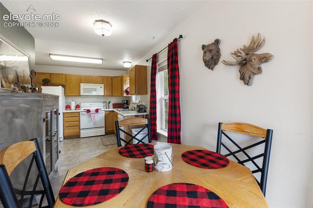 Image 17 of 36: In kitchen dining and you are off to explore the great outdoors and the cit