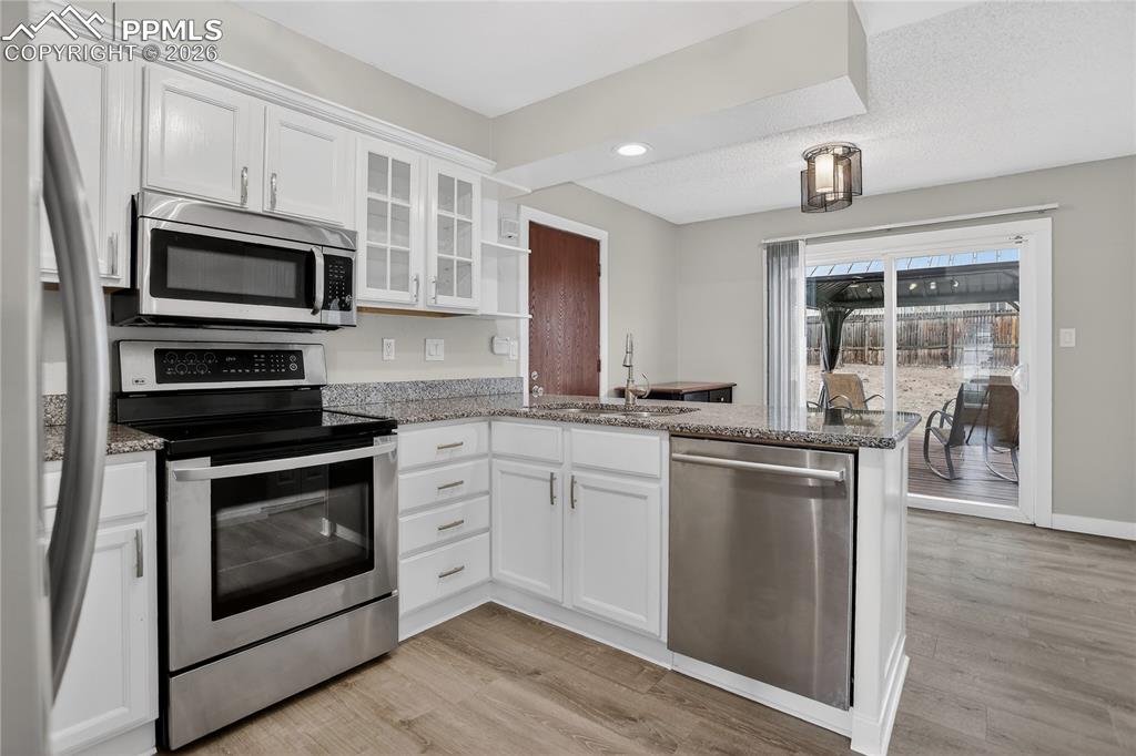 Image 5 of 20: Walk-out to backyard