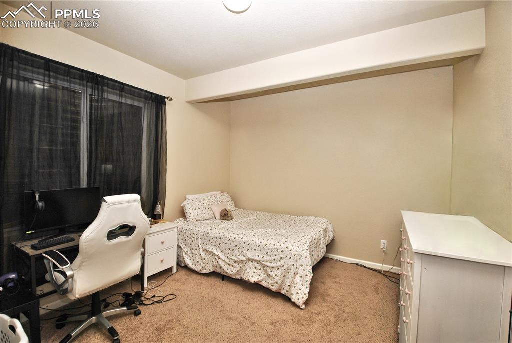 Image 31 of 38: Bedroom