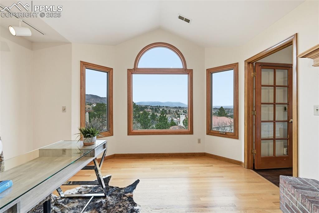 Image 26 of 49: Office space featuring plenty of natural light, light wood-style floors, va