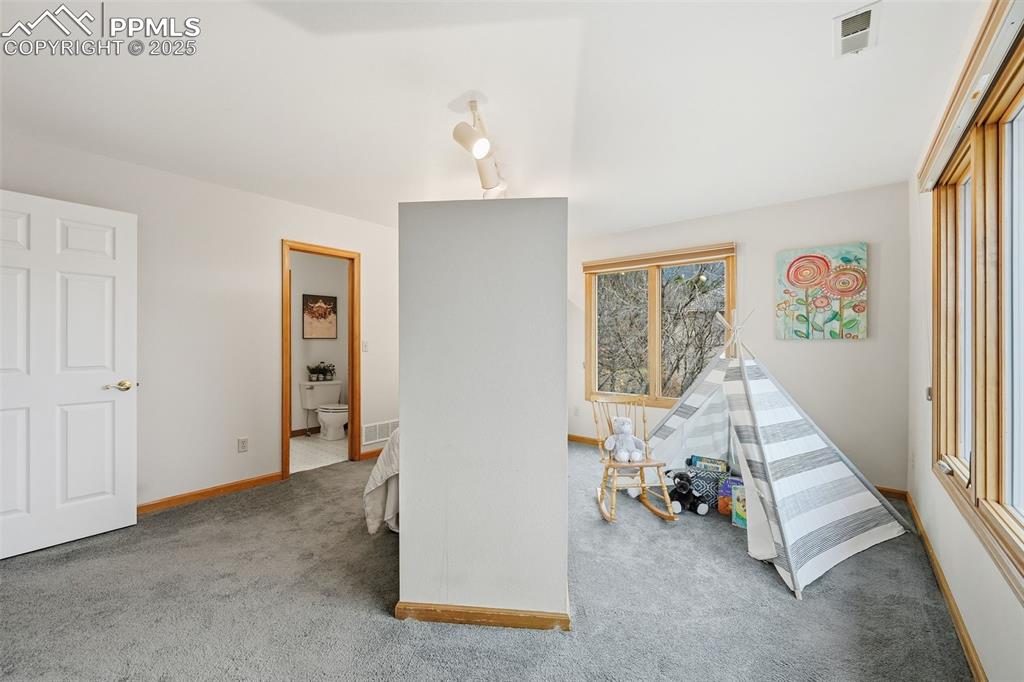 Image 33 of 49: Recreation room featuring light carpet