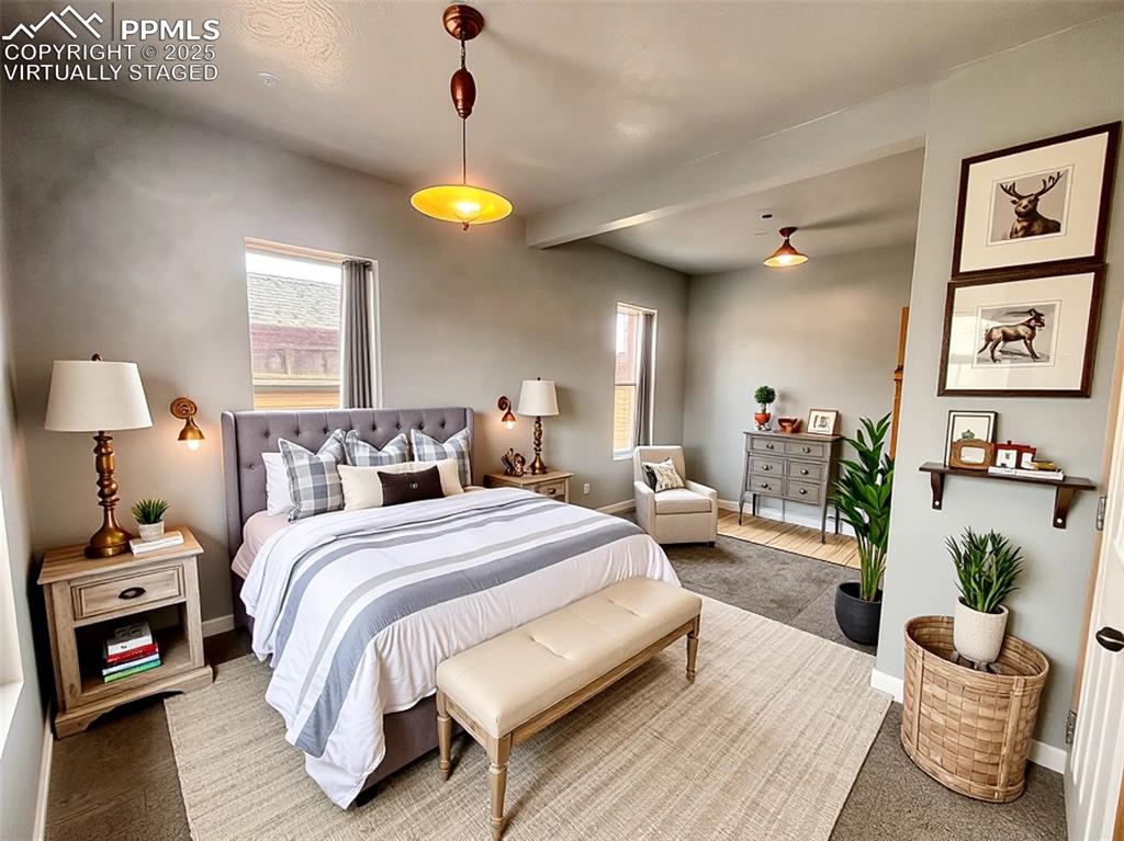 Image 12 of 35: Virtually staged Carpeted bedroom featuring baseboards