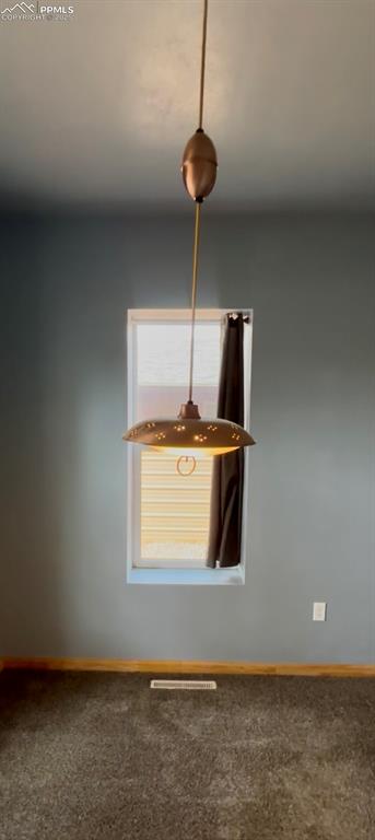 Image 16 of 35: Carpeted empty room with baseboards