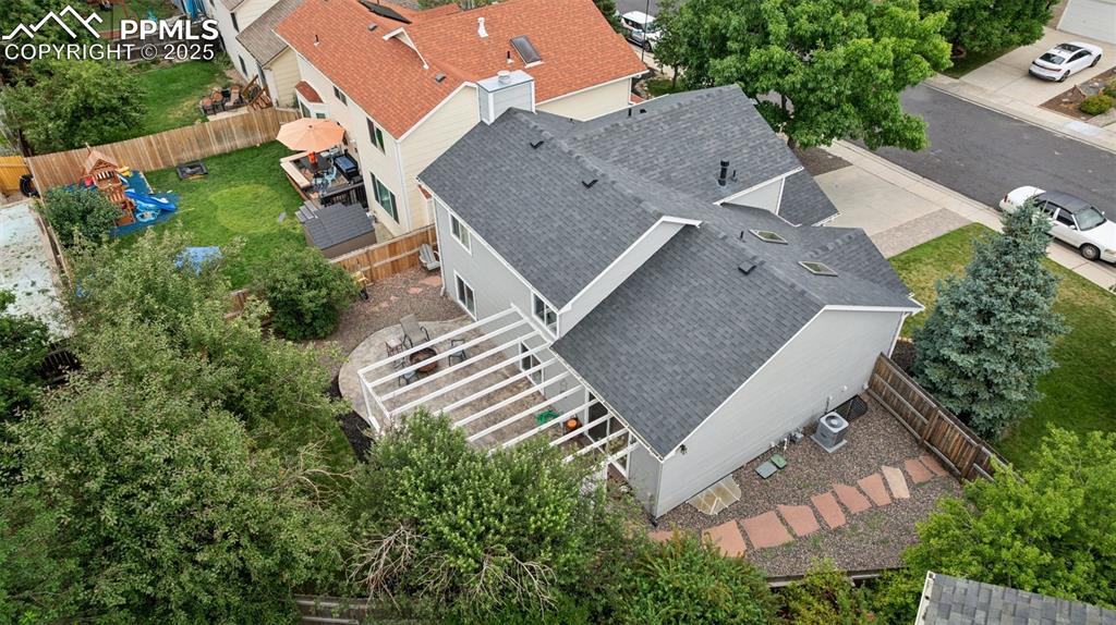 Image 8 of 32: Aerial view of property and surrounding area