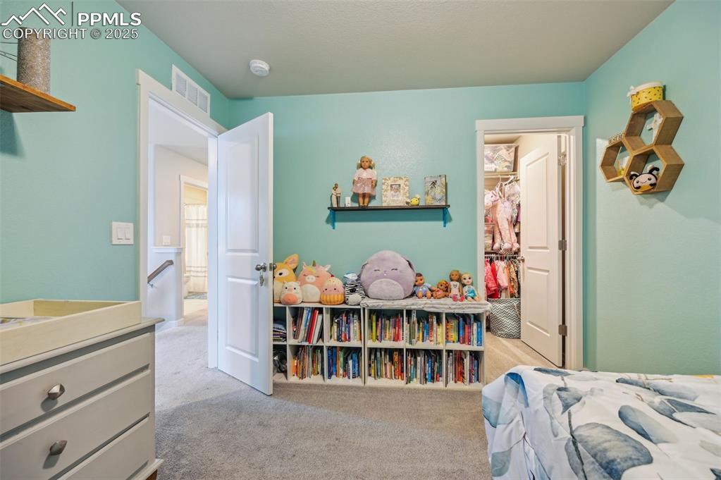 Image 18 of 46: Walk-in Closet