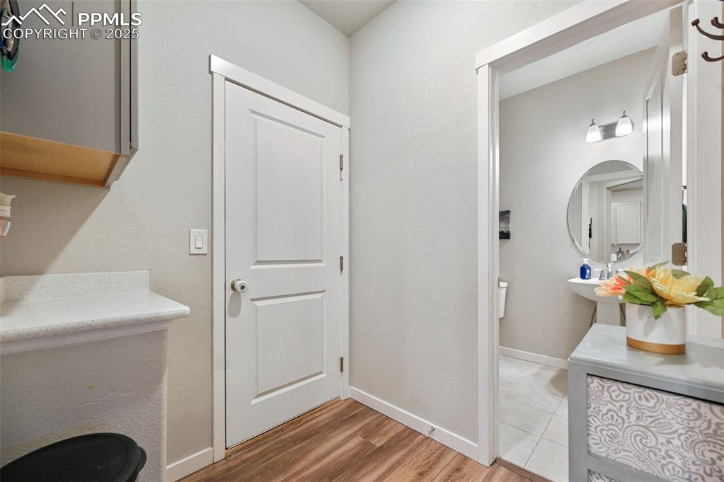 Image 3 of 46: Mudroom area off of garage.