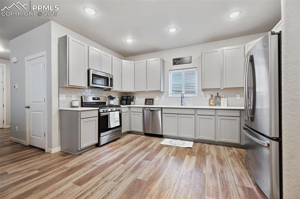 Image 5 of 46: Kitchen, Gas Stove, Stainless Steel, Soft-close grey cabinets, Quartz Count
