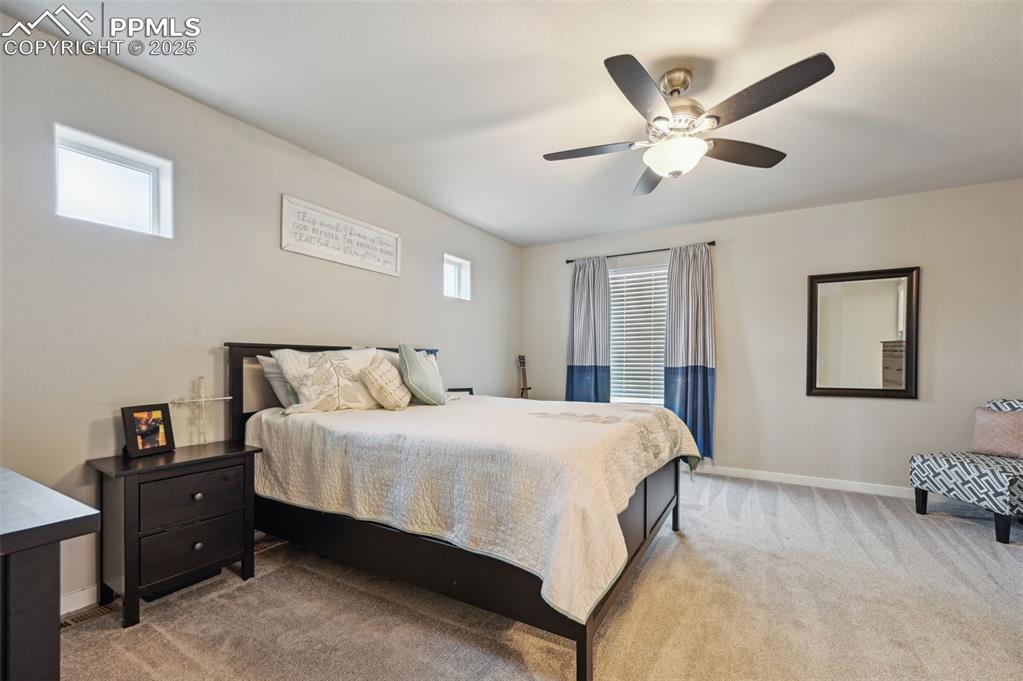 Image 7 of 46: Primary Bedroom with ensuite and walk-in closet.