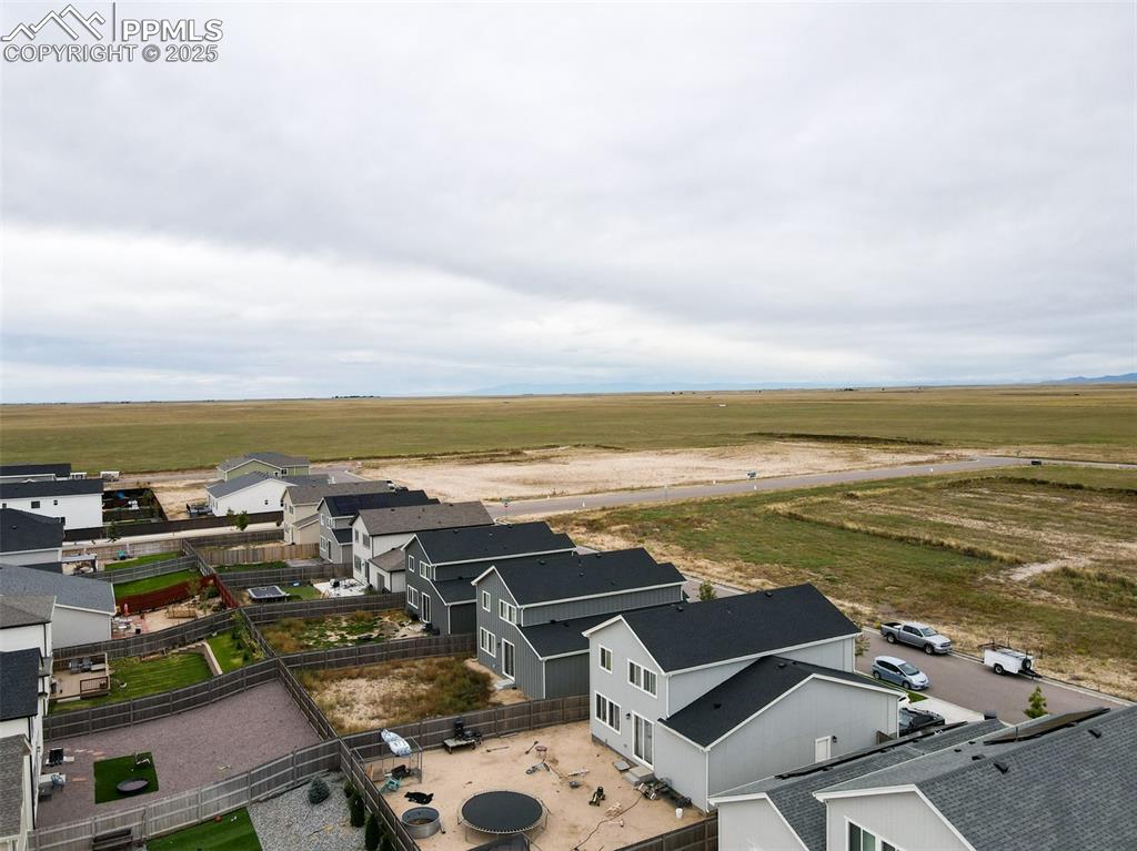 Image 14 of 50: View of rural area featuring nearby suburban area