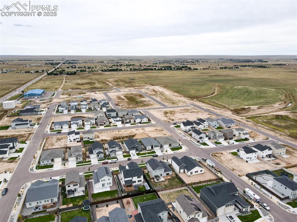 Image 20 of 50: View of property location featuring nearby suburban area