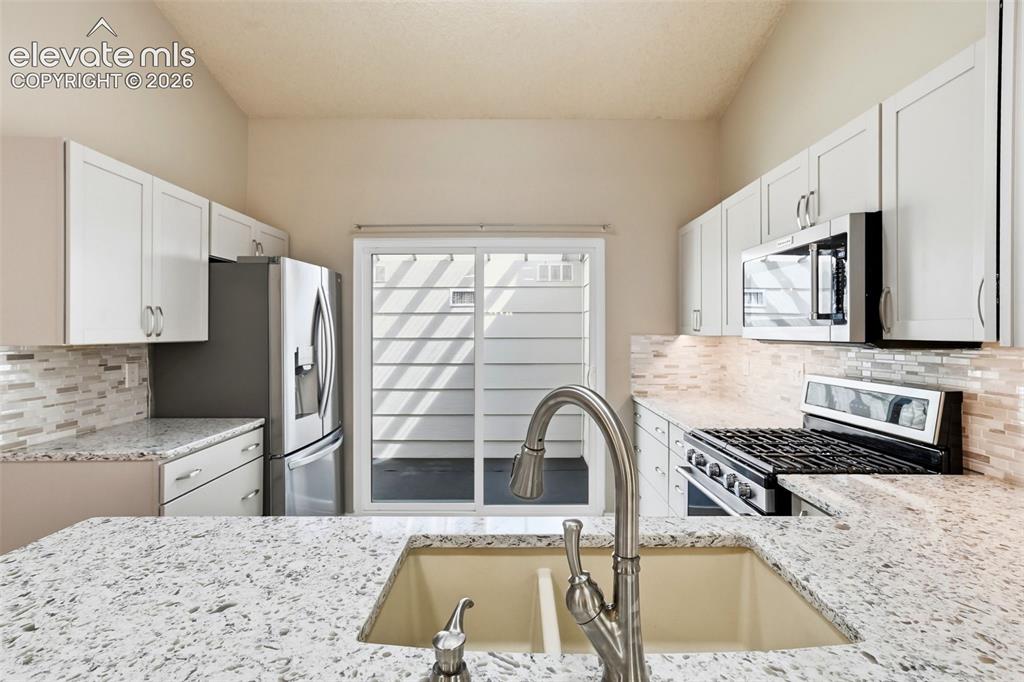 Image 11 of 49: Completely remodeled kitchen