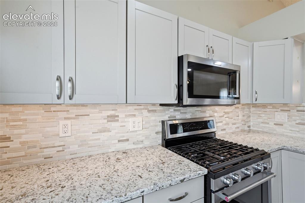 Image 14 of 49: Stainless appliances