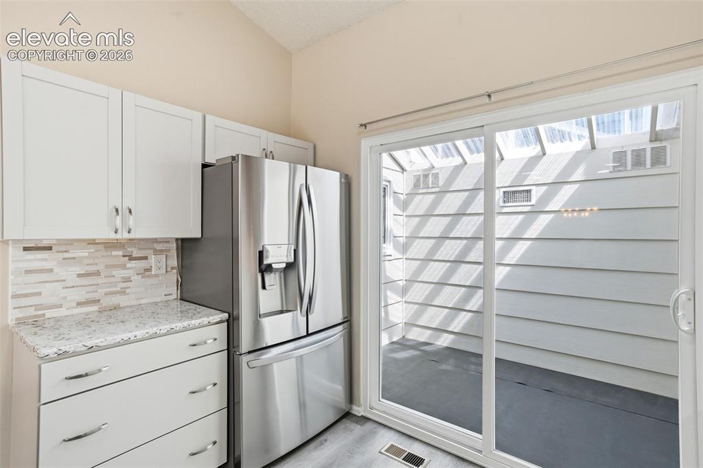 Image 15 of 49: French door refrigerator with bottom freezer drawer