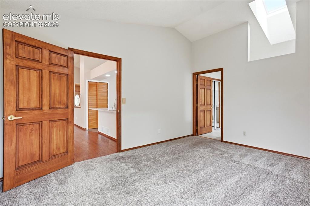 Image 27 of 49: Skylight and adjoining bathroom