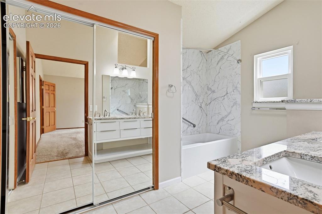 Image 28 of 49: Completely remodeled, open & airy