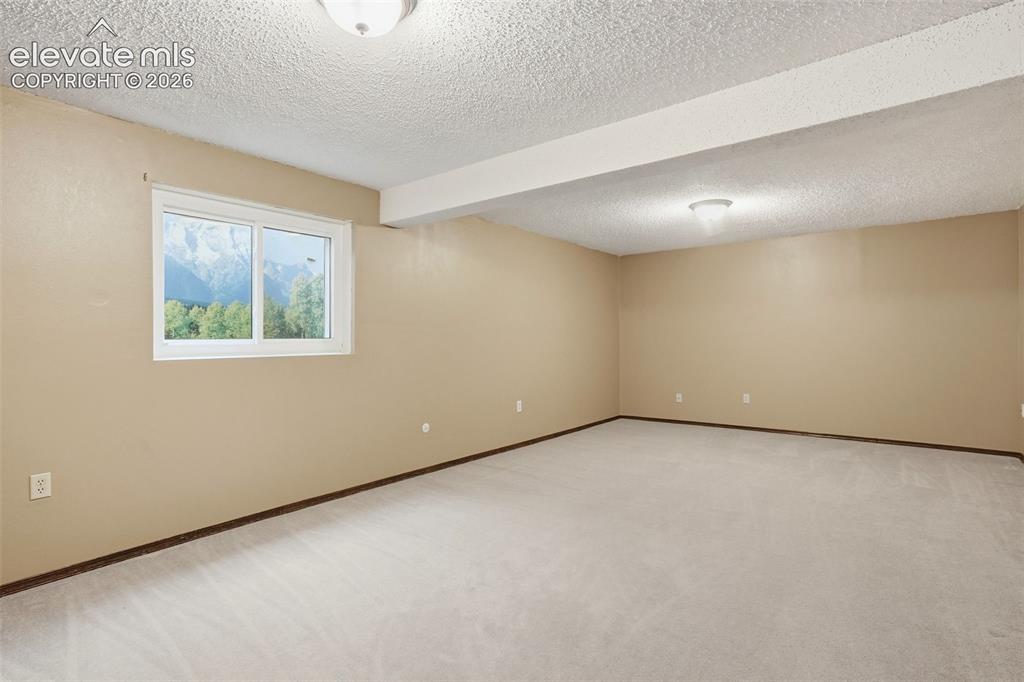 Image 39 of 49: Huge 23x13 family room with plenty of room to play or entertain