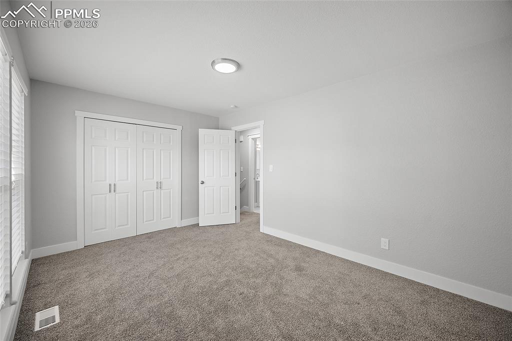 Image 14 of 38: Bedroom