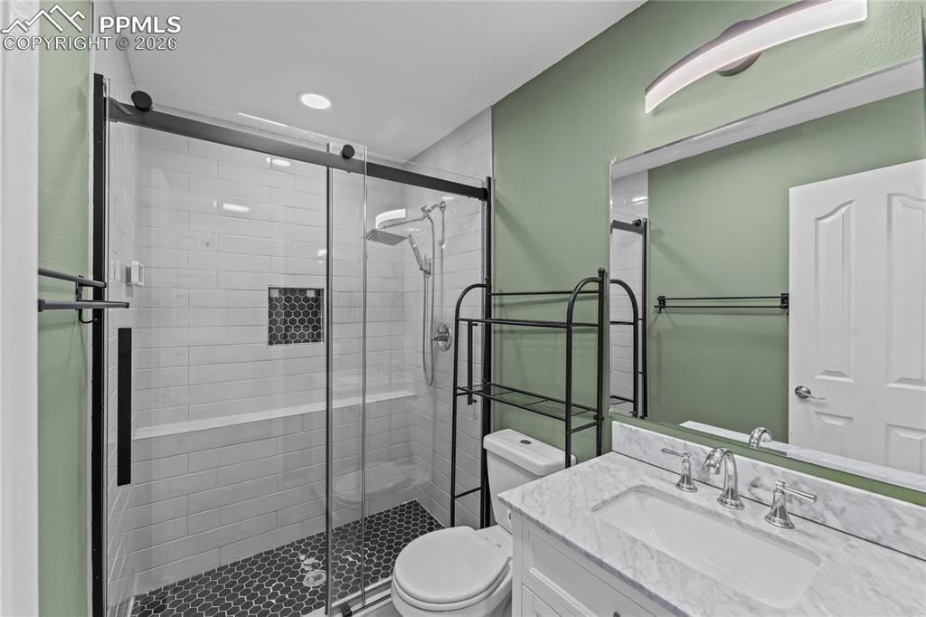 Image 21 of 30: Lower level updated bathroom