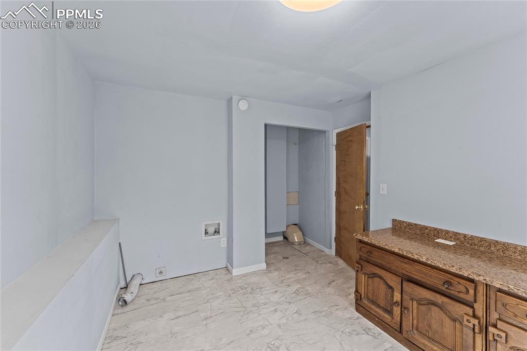 Image 22 of 30: extra large laundry room