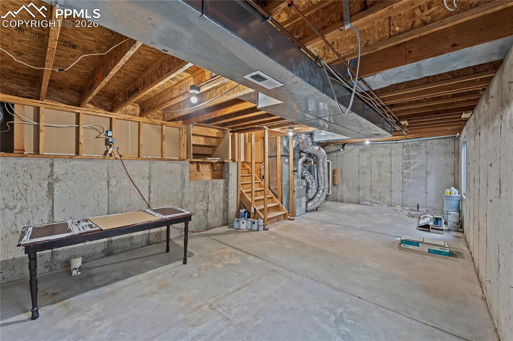 Image 24 of 30: Unfinished basement