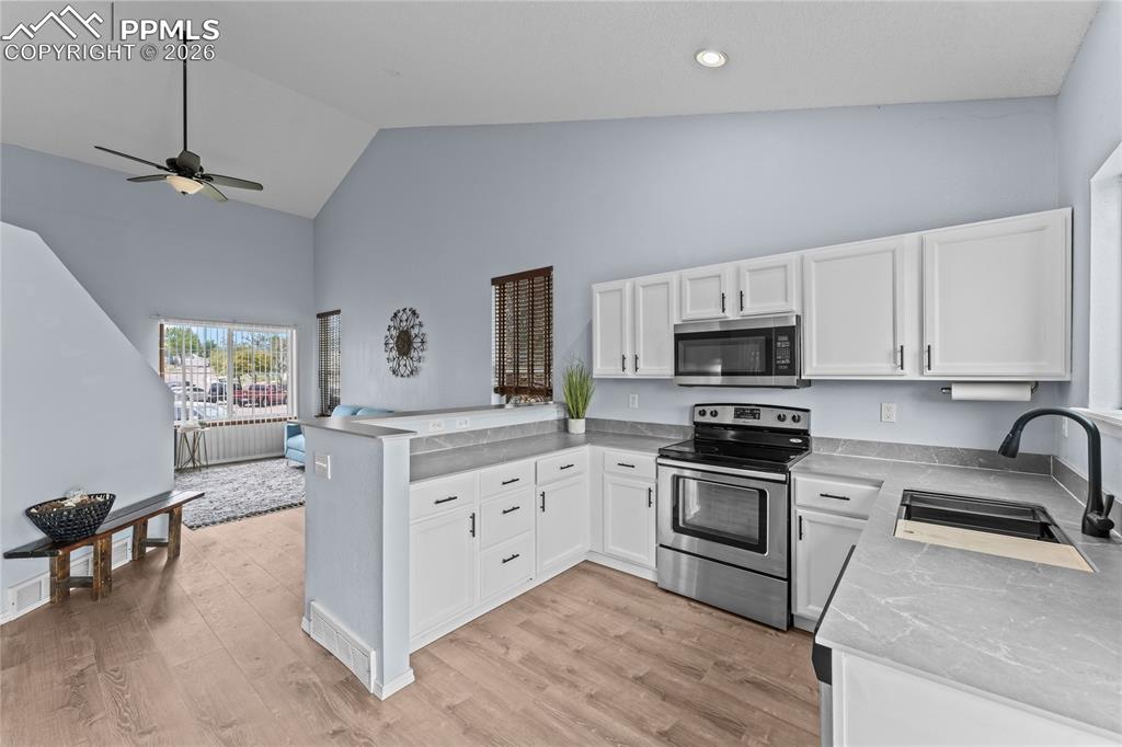 Image 9 of 30: Large open concept dining area 