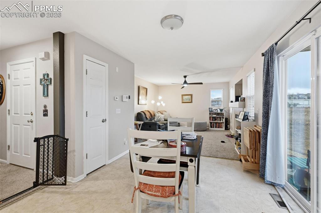 Image 5 of 18: Dining area with walkout.