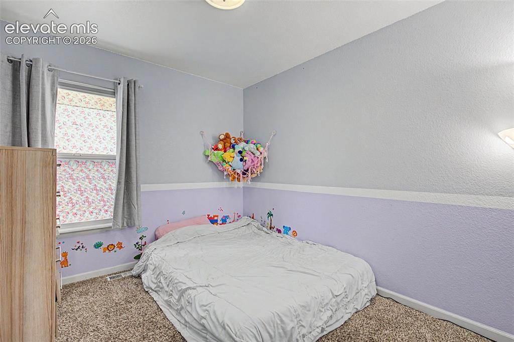 Image 19 of 41: Bedroom