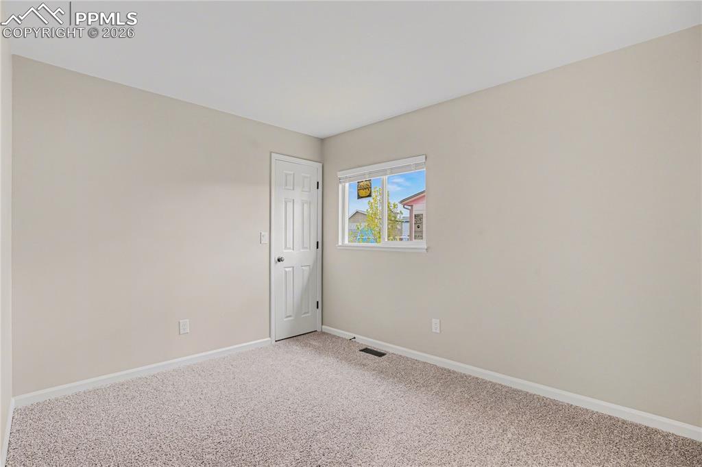 Image 27 of 34: Bedroom