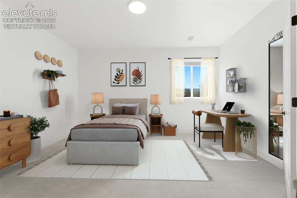 Image 37 of 46: Virtually staged. White walls with a single window, recessed lighting, and 