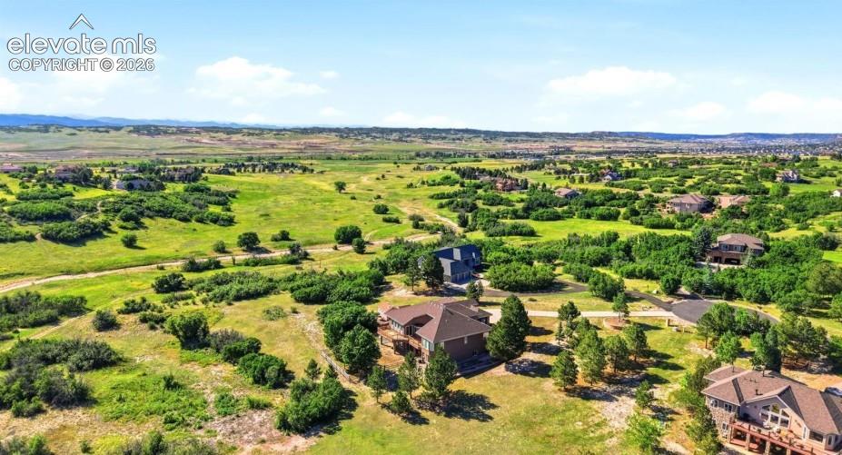 Image 43 of 46: Expansive natural landscape with scattered residential properties
