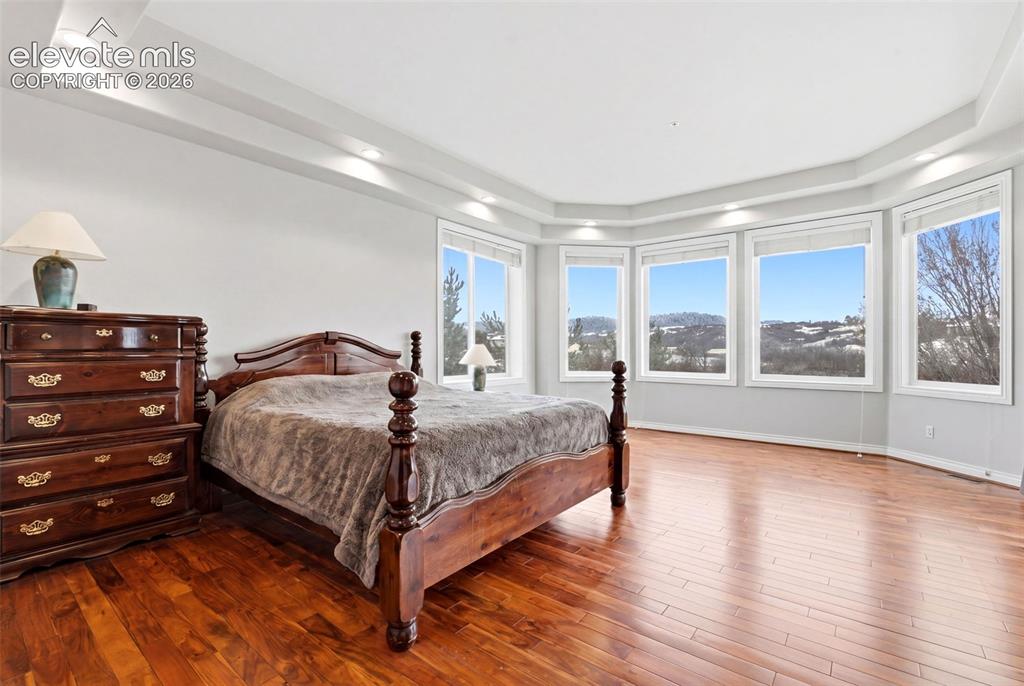 Image 5 of 46: Tray ceiling with recessed lighting