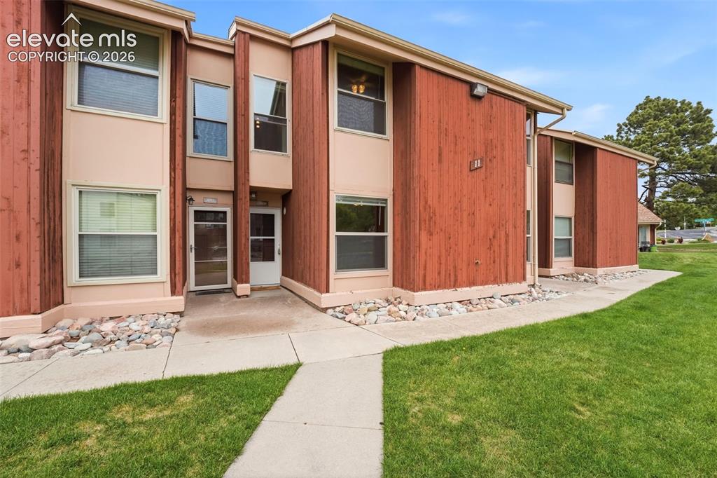 Image 1 of 44: 4509 is nice, white door in middle of building