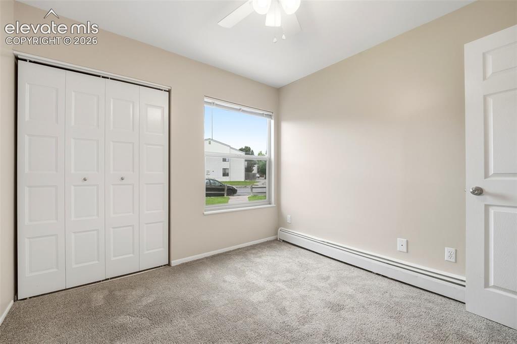Image 14 of 44: Main level bedroom