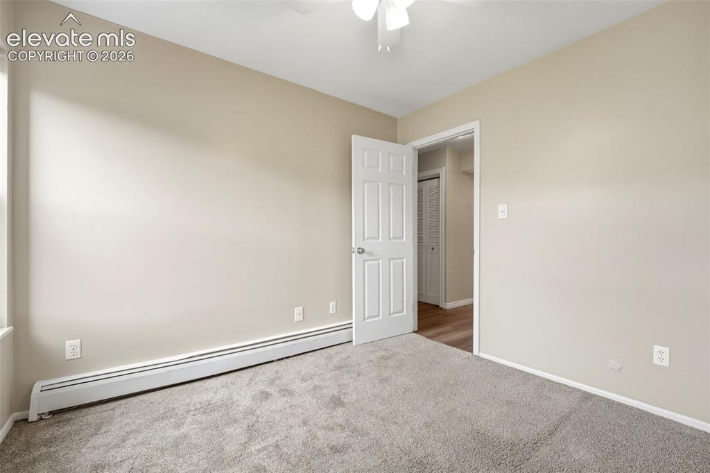 Image 15 of 44: Main level bedroom