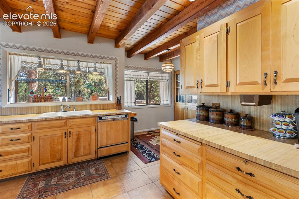 Image 17 of 33: With lots of cabinet space!