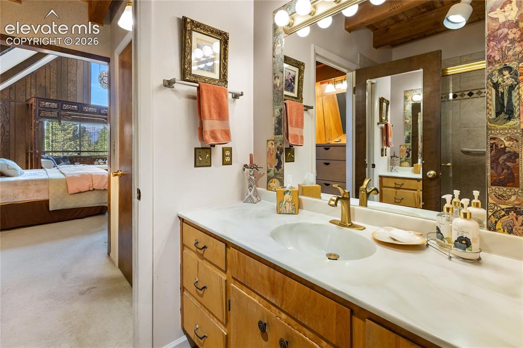 Image 20 of 33: This is a main level 3/4 bath attached on 2 sides to the Primary and Kitche
