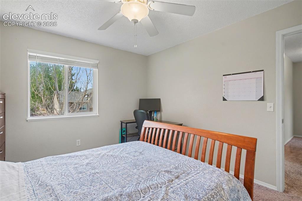 Image 29 of 37: Neutral wall finishes with a window offering natural light, complemented by