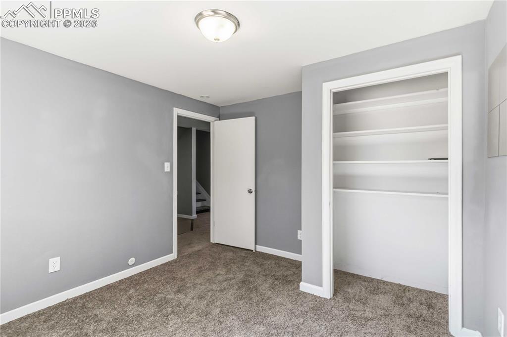 Image 20 of 42: Garden level bedroom.