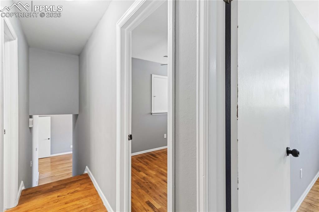 Image 22 of 42: Upstairs to 3 bedrooms and a full bathroom.