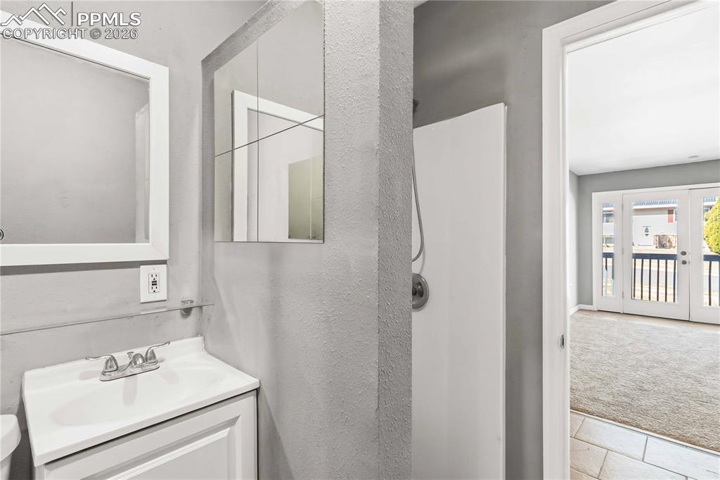 Image 35 of 42: Bonus room ensuite bathroom with shower.
