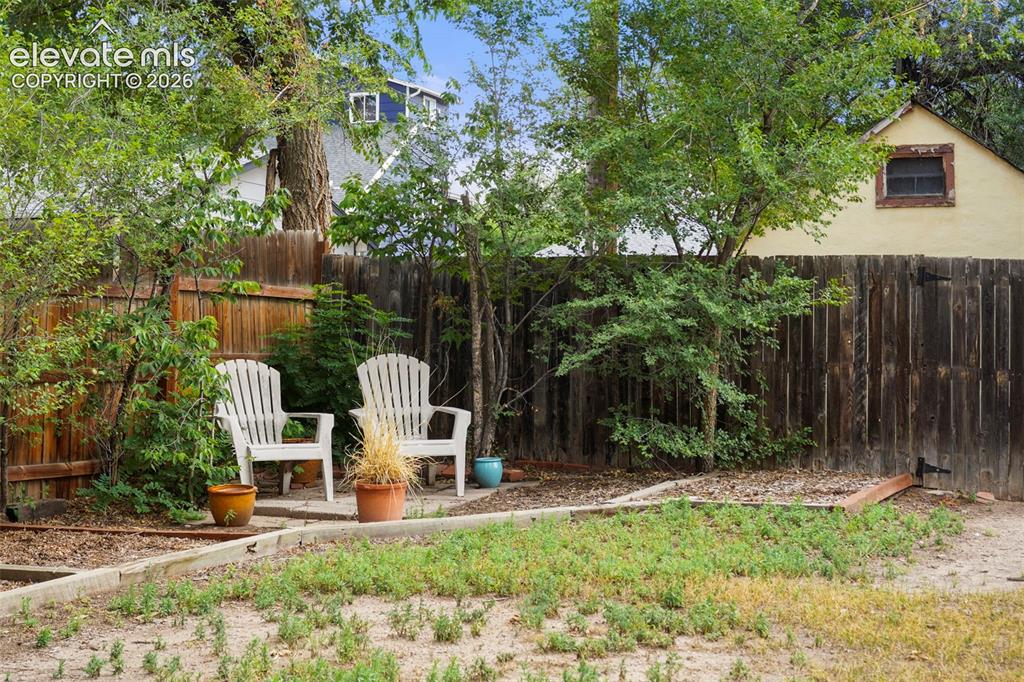Image 22 of 29: Great sitting area towards the back of the lot