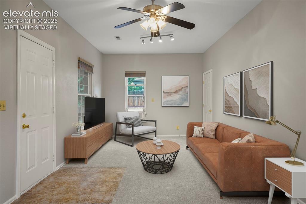 Image 5 of 29: The living room is open and bright! (Virtually Staged)