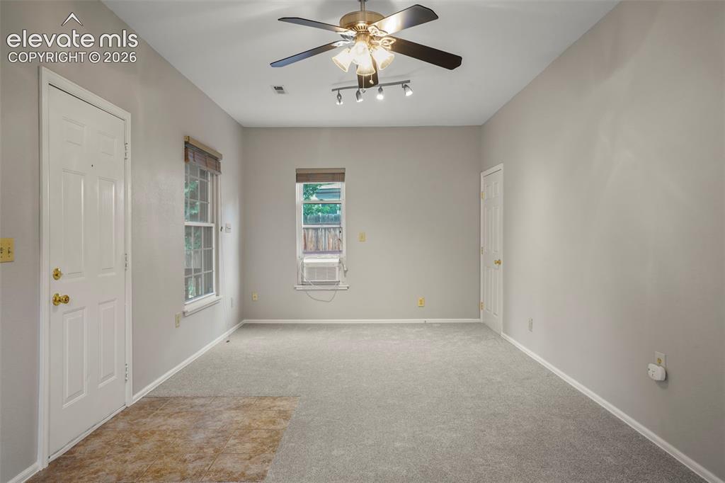 Image 7 of 29: Living Room- new carpet and paint!