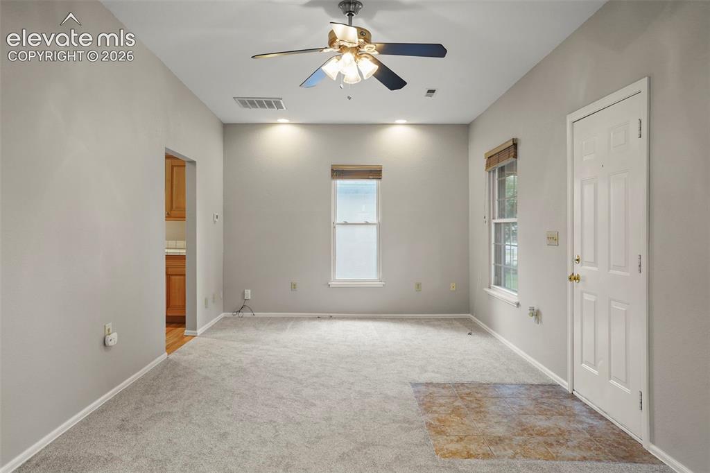 Image 8 of 29: Living Room- new carpet and paint! 