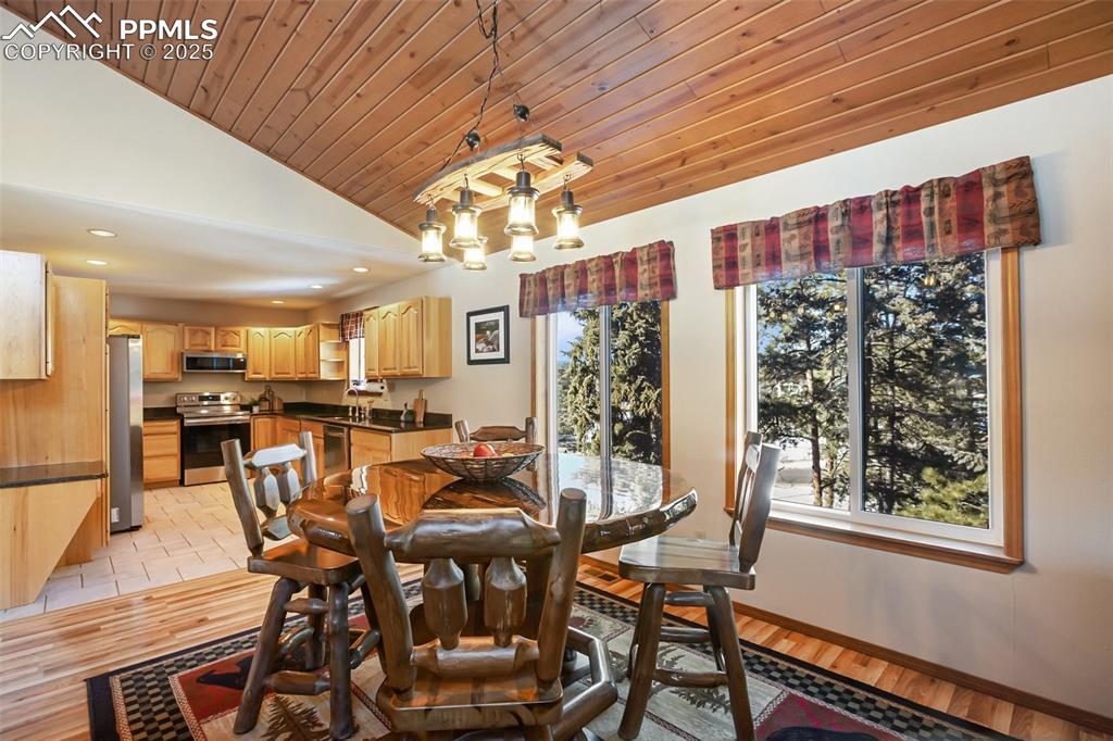 Image 13 of 50: Dining room adjacent the kitchen