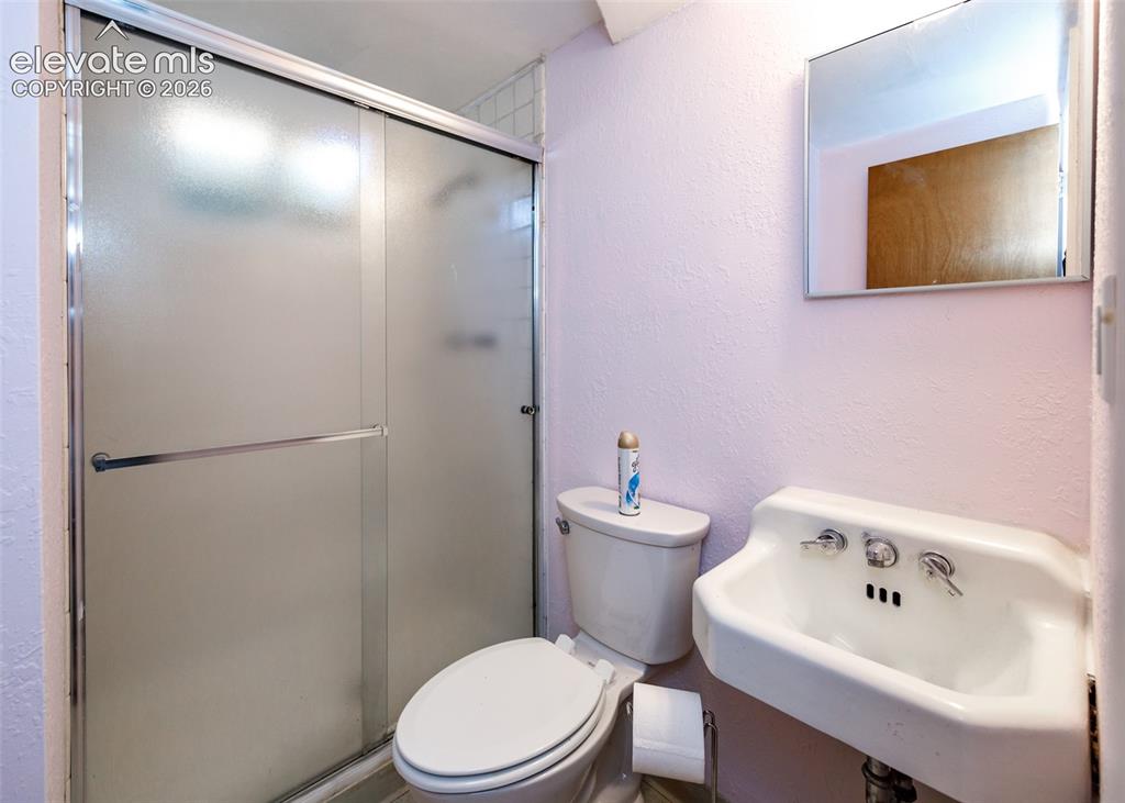 Image 26 of 26: Downstairs Bathroom