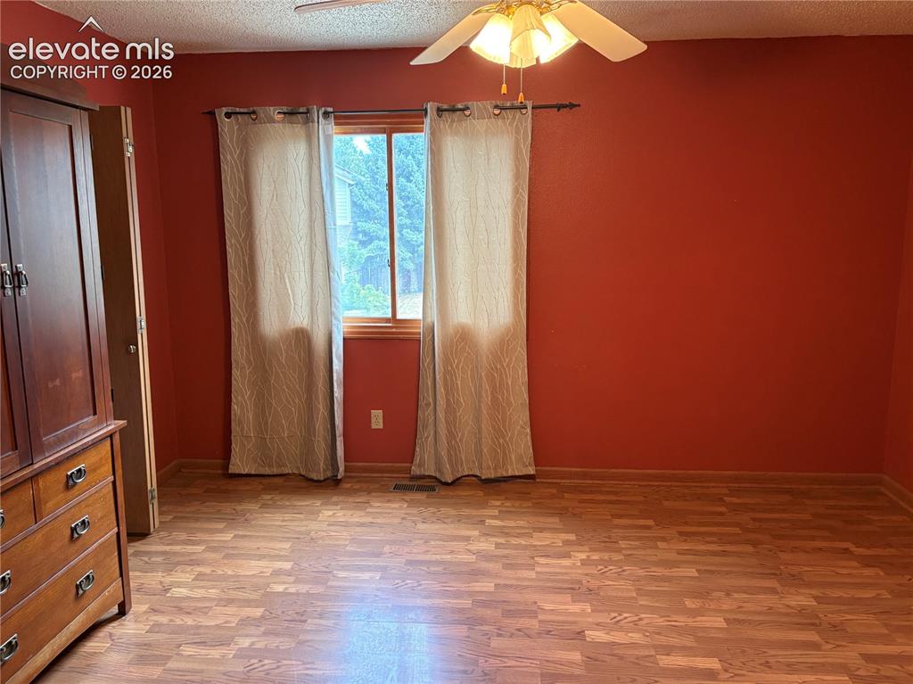 Image 4 of 11: Primary Bedroom