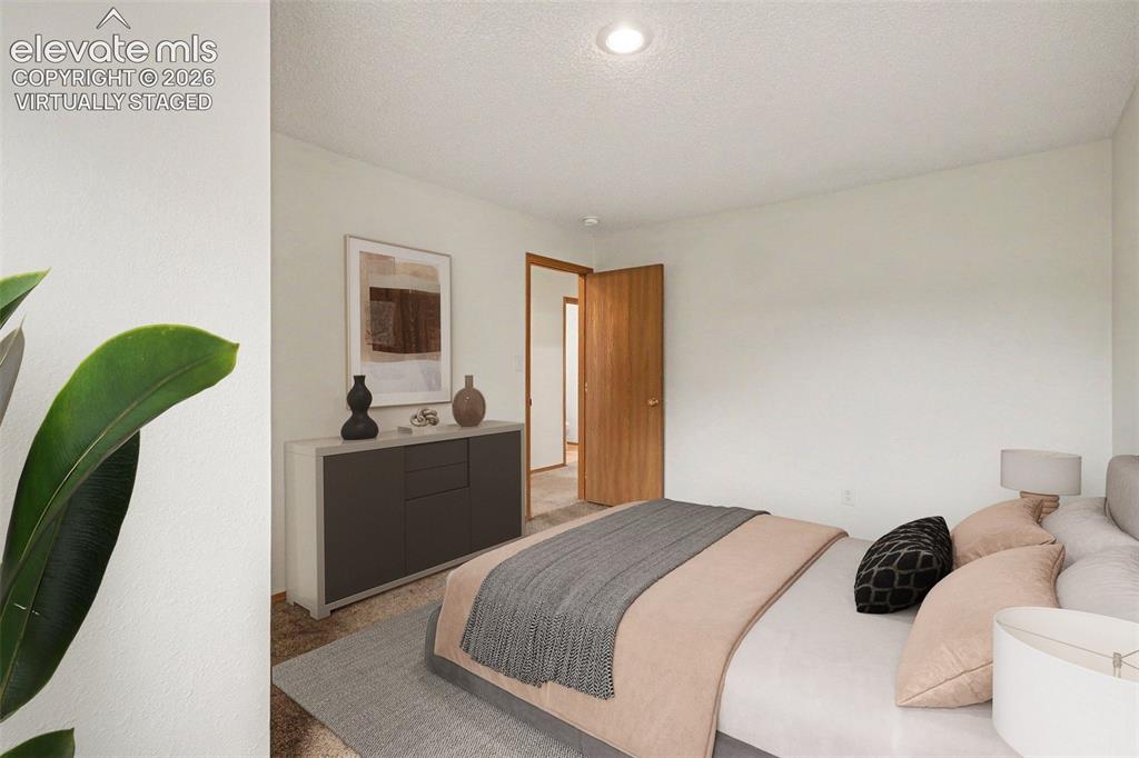 Image 15 of 30: Virtually staged bedroom 2