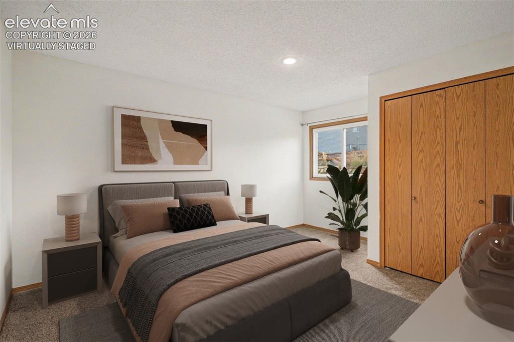 Image 16 of 30: Virtually staged bedroom 2