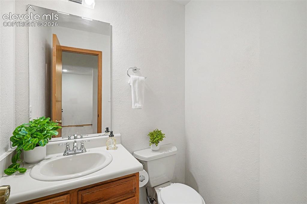 Image 19 of 30: Half bath